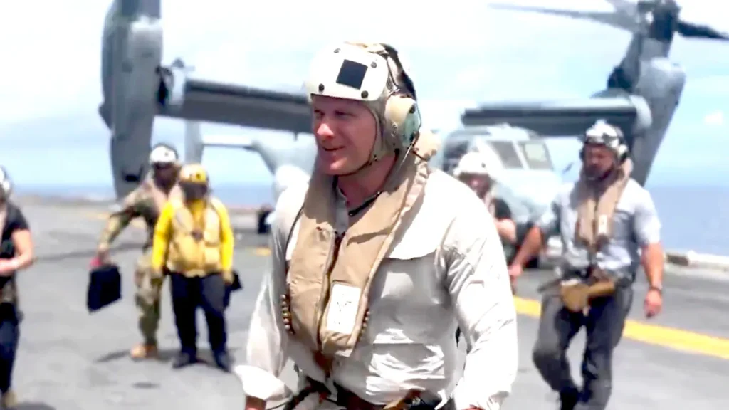 US Venezuela tensions showing US military personnel and aircraft carrier operations during heightened Caribbean maritime security activity