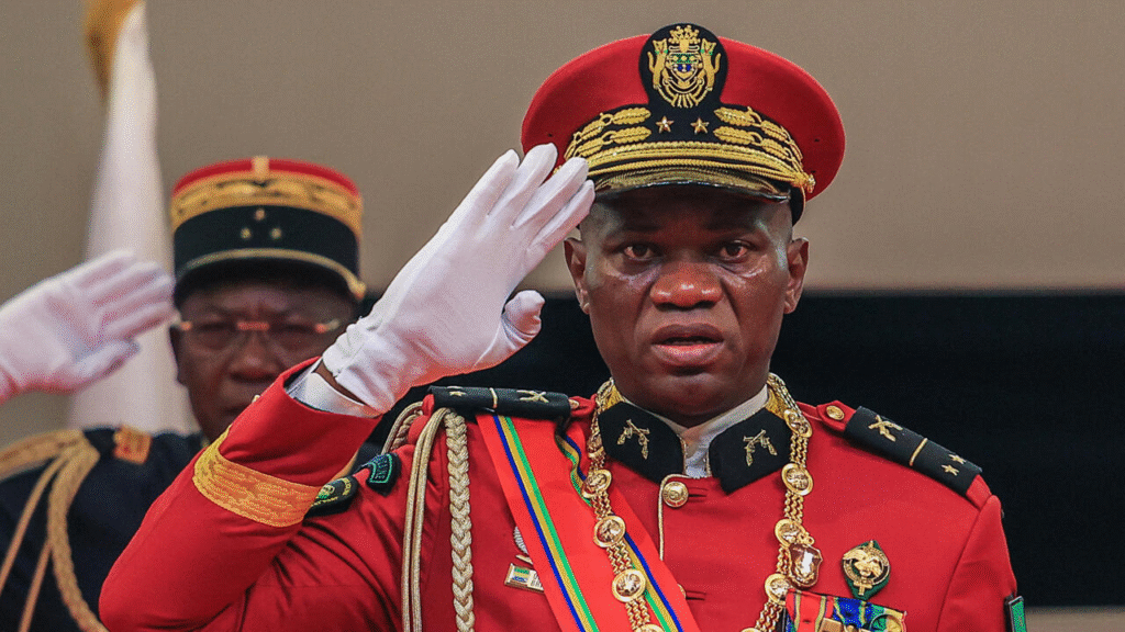 Military leader during a Sub-Saharan African coup-related state ceremony, highlighting political instability and security risks in coastal African states — Ambrey Insight on Sub-Saharan African military coups and maritime operational exposure