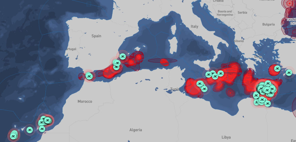 Ambrey Insight map showing a container ship with a small boat carrying people alongside the vessel during a maritime assistance operation